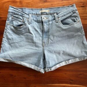 Levi’s mid length light wash shorts